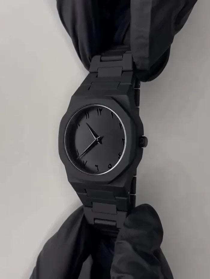 Blacks stainless steel watch with movement