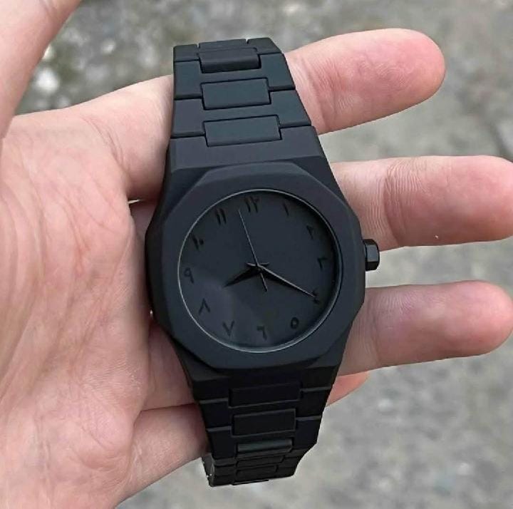 Blacks stainless steel watch with movement